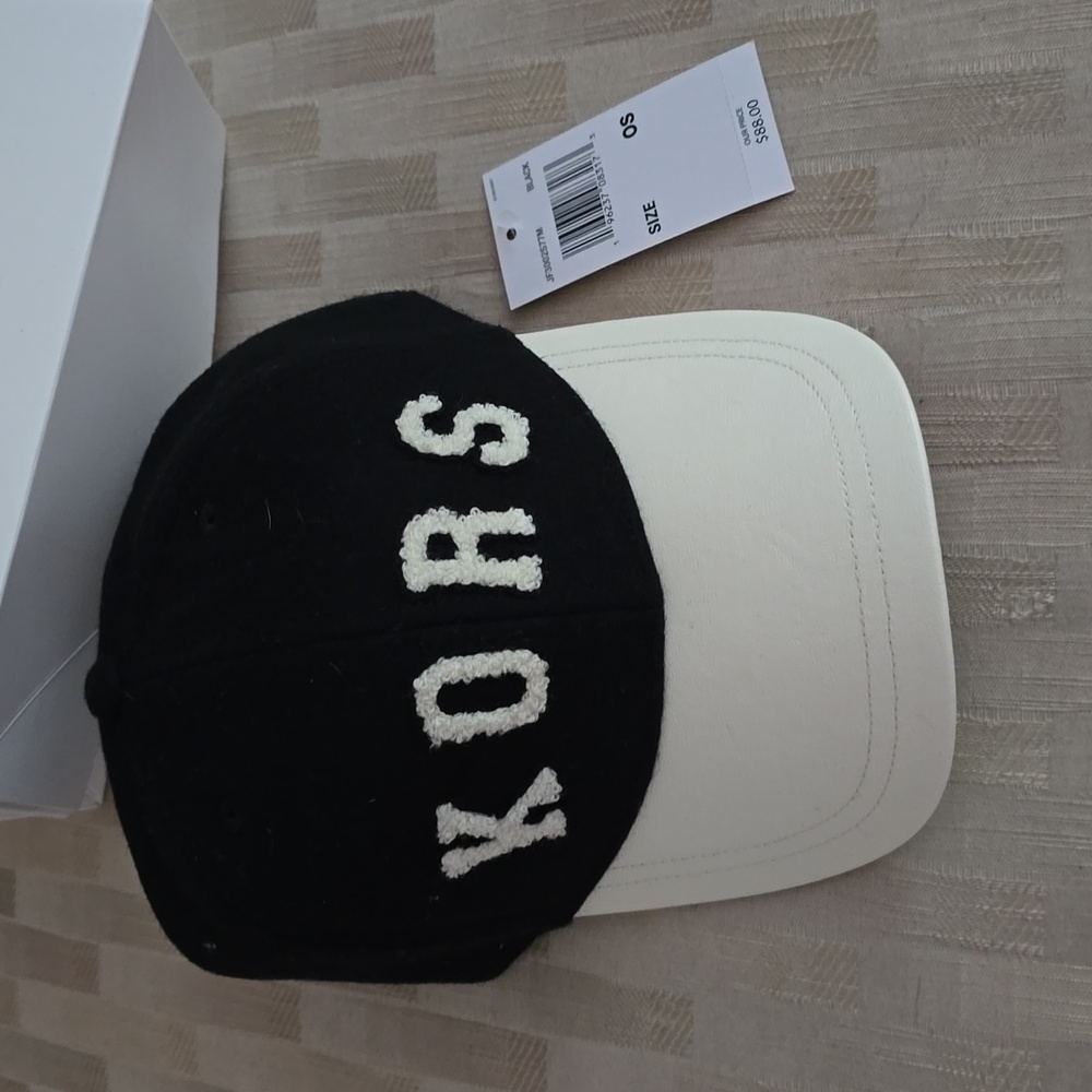 Michael Kors Baseball Cap Never worn, NWT. Black felt top and cream leather